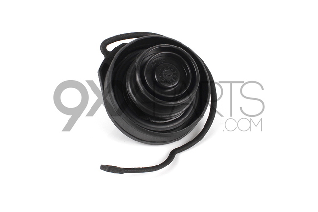 cap with retaining strap for
fuel tank